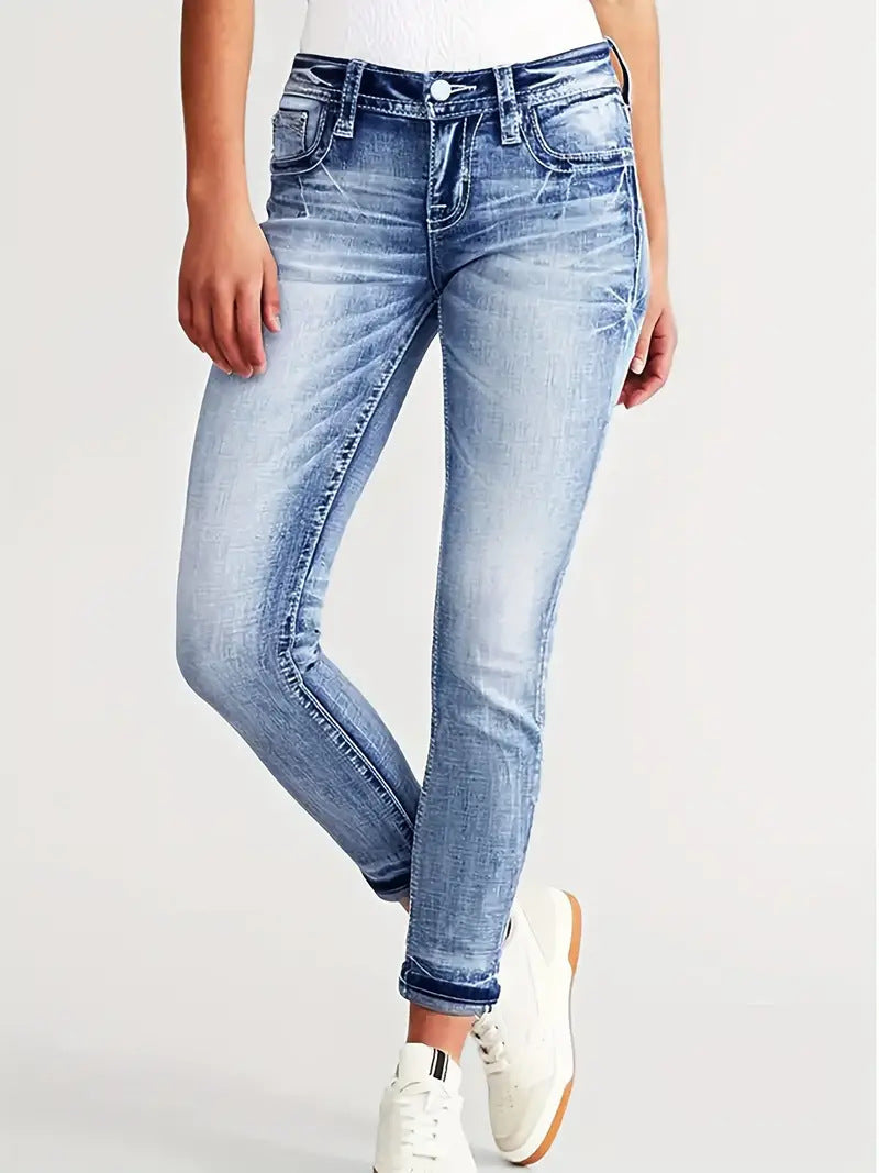 Whiskered skinny jeans