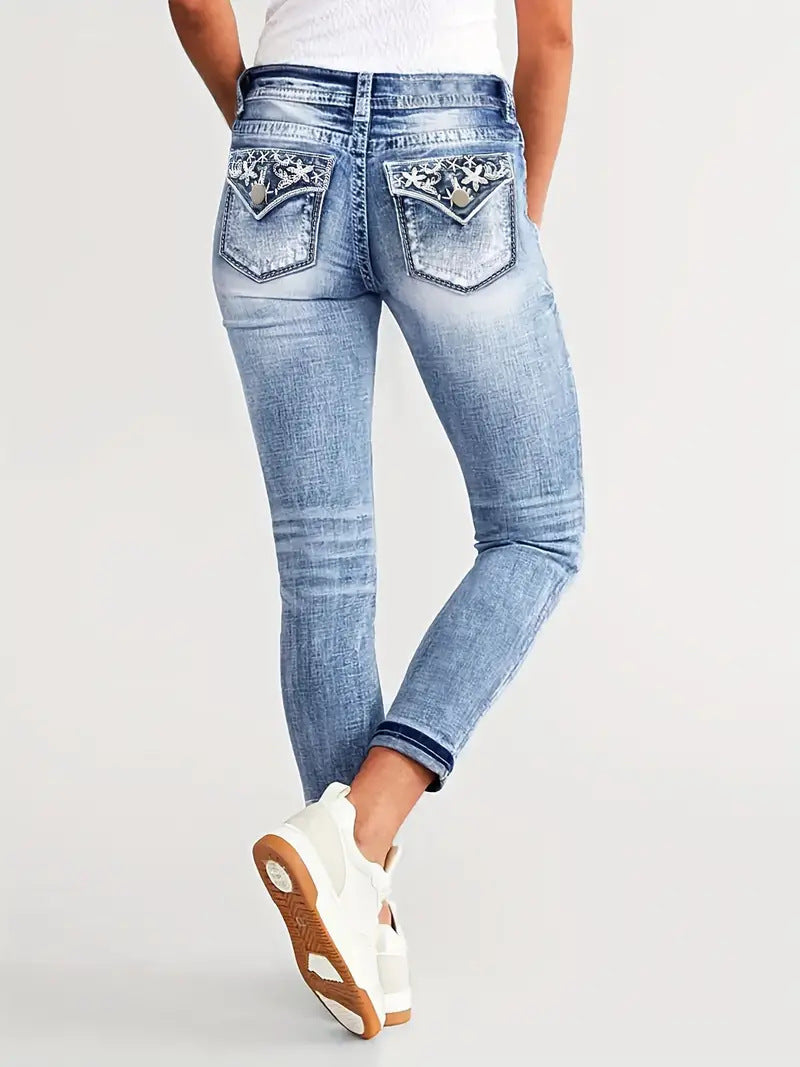 Whiskered skinny jeans